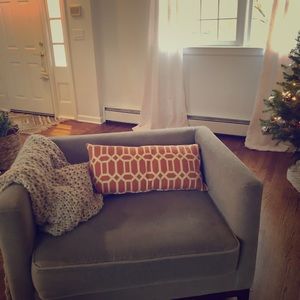 Orange and white accent pillow